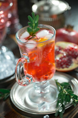 Refreshing summer alcoholic cocktail with crushed ice and citrus fruits