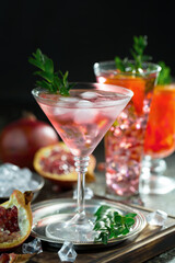 Fruit cocktail, in a glass with natural healthy fruits on a table with kitchen accessories.