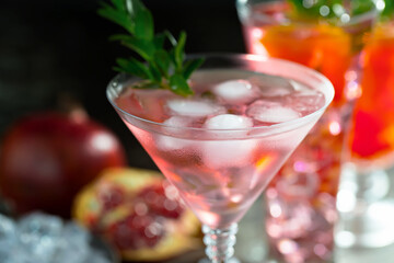 Fruit cocktail, in a glass with natural healthy fruits on a table with kitchen accessories.