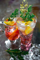 Refreshing summer alcoholic cocktail with crushed ice and citrus fruits