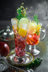 Glasses of wine on a black background.