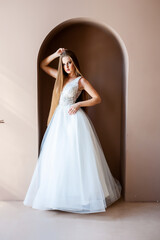 Fototapeta premium Beautiful bride in a wedding dress
