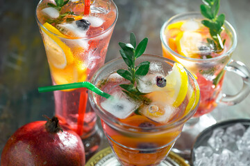 Refreshing summer alcoholic cocktail with crushed ice and citrus fruits