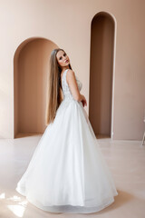 Fototapeta premium Beautiful bride in a wedding dress