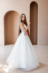 Fototapeta premium Beautiful bride in a wedding dress