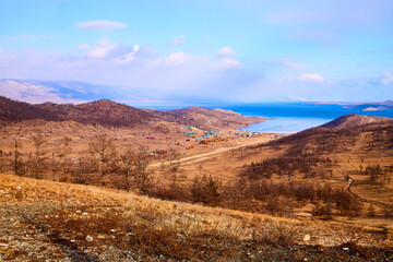 Nature landscape with golden hills with a blue sky with white clouds in a day or a evening