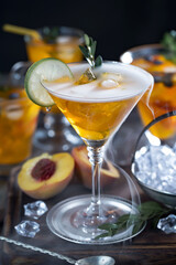 Fruit cocktail, in a glass with natural healthy fruits on a table with kitchen accessories.