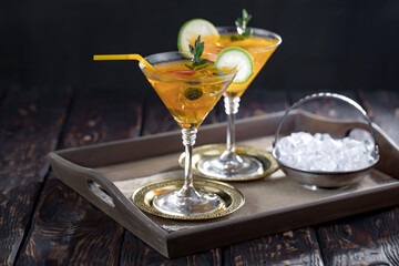 Refreshing summer alcoholic cocktail with crushed ice and citrus fruits