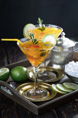 Refreshing summer alcoholic cocktail with crushed ice and citrus fruits