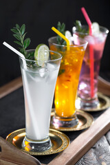 Refreshing summer alcoholic cocktail with crushed ice and citrus fruits