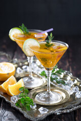 Refreshing summer alcoholic cocktail with crushed ice and citrus fruits