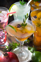 Glasses of wine on a black background.