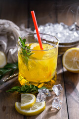 Refreshing summer alcoholic cocktail with crushed ice and citrus fruits