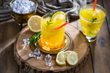 Refreshing summer alcoholic cocktail with crushed ice and citrus fruits