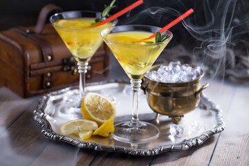 Fototapeta premium Refreshing summer alcoholic cocktail with crushed ice and citrus fruits