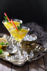 Glasses of wine on a black background.