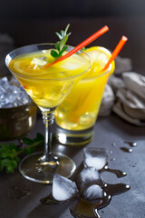 Refreshing summer alcoholic cocktail with crushed ice and citrus fruits