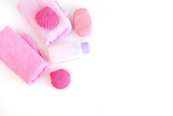Spa set. Towel, soap, washcloth, care products, bath bombs in pink and pale purple. Place for your...