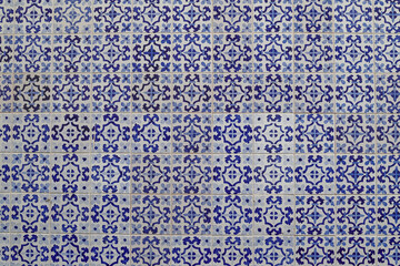 Blue and white traditional spanish tiles wall background