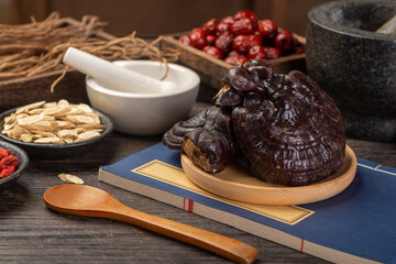 Ganoderma lucidum and traditional Chinese medicine on the table