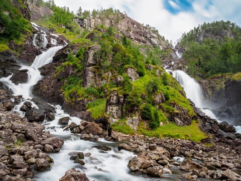 View on Langfossen waterfall in summer, Etne, Norway