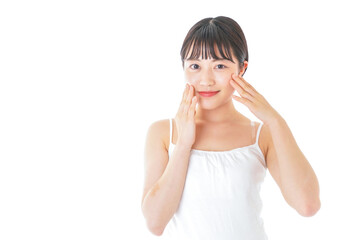 Fototapeta premium 肌のケアをする若い女性