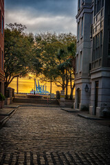 distant boat through street buildings