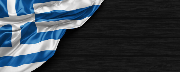 Close Up of Greece flag on the black wooden background 3D render - obrazy, fototapety, plakaty