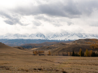 Fototapeta na wymiar Autumn view of the Altai mountains. Severo-Chuysky ridge, Chuysky tract, Altai Republic, Russia