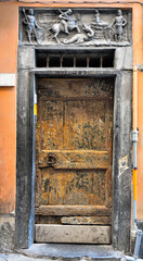 Fototapeta na wymiar historical portal in via pre in genoa italy