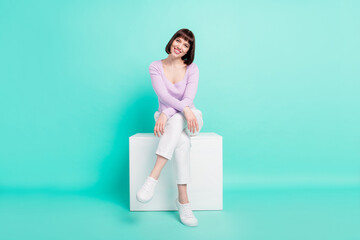 Full length body size photo woman sitting wearing stylish clothes happy cheerful isolated vibrant...