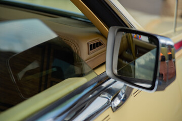 Old Cadillac Thunderbird, detail photos of lamp, mirror, drive wheel, handle,  - obrazy, fototapety, plakaty