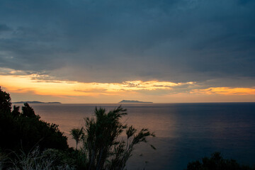 Fototapeta na wymiar Sunset on cape Drastis near Logas Beach , Peroulades, Corfu island Greece