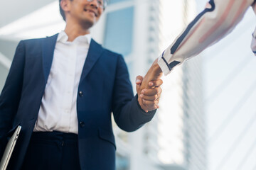 businessman shaking hands on a business cooperation agreement. Successful business woman...
