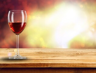 Red wine in an elegant glass on the desk