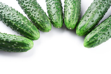 Set of fresh whole cucumbers on white background, food pattern. Garden cucumber wallpaper backdrop design