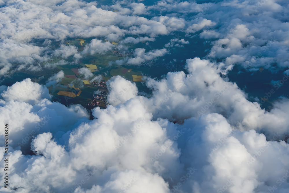 Aufkleber view of the sky above the clouds. blue sky high view from airplane window clouds shapes. sky-clouds 