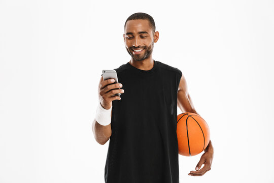 Happy african young basketball player