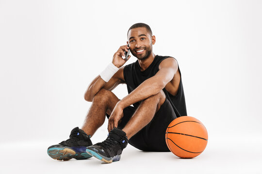 Happy african young basketball player