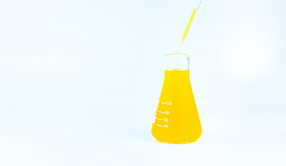 yellow science experiment glass tube,tubes of yellow liquid on white background