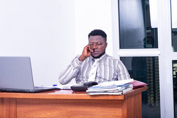 serious adult businessman working in office.