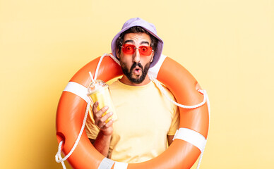 expressive crazy bearded man wearing hat and sun glasses. hollidays concept - obrazy, fototapety, plakaty