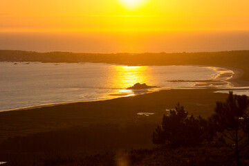 Fototapeta premium Sunset at the mouth of a river