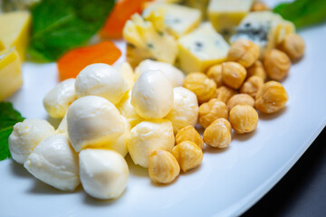 Sulguni and chechil cheese served on plate for wine appetizer 