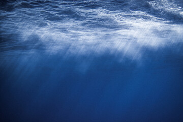 blue clear Water Sunlights Rays on surface