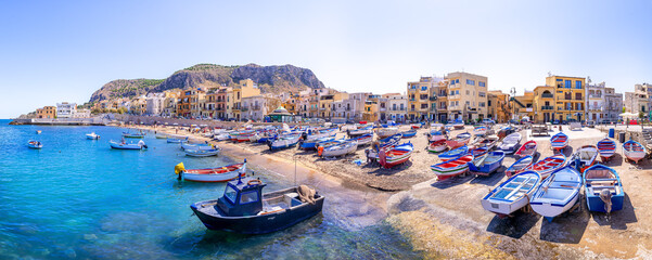 colorful fishing boats at the port of aspra, sicily