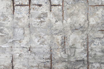 Texture of old gray concrete wall for background.Texture detail of metal revealed on concrete wall.Stone wall background. Concrete texture.