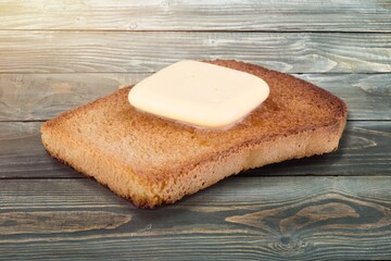 Slice of bread with cream cheese, toast with melted cheese
