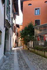 Cividale del Friuli (Udine), Italy - September 5, 2021: North Italy Life in the center of the lombard medieval city. Walking through narrow streets and walls. Sunny summer day. Selective focus