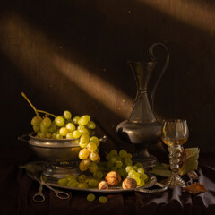 Still life with vintage items, fresh ripe grape